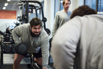 A gym goer lifting weights