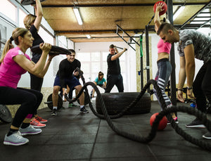 A group of gym goers at a bootcamp